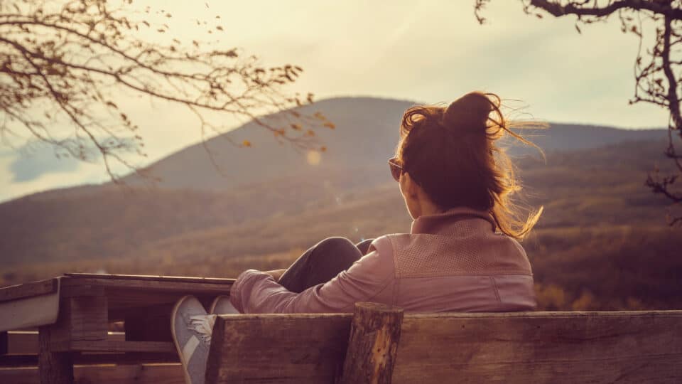 Woman Enjoying Sunset.