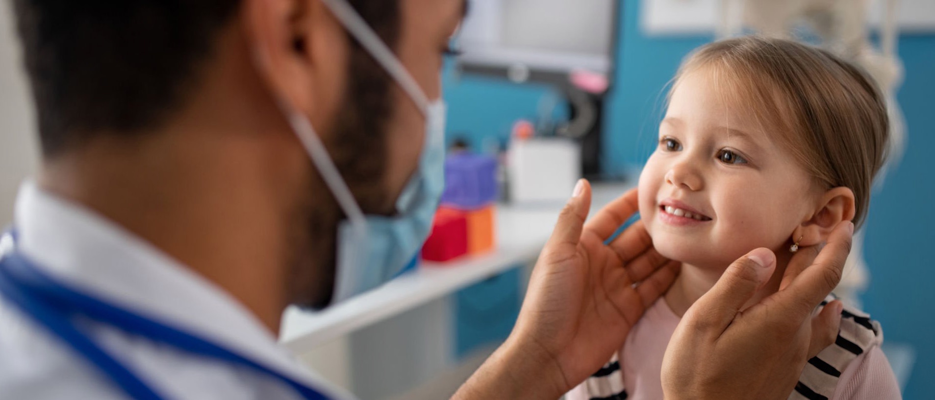 CRMC doctor performing a checkup on a young patient.