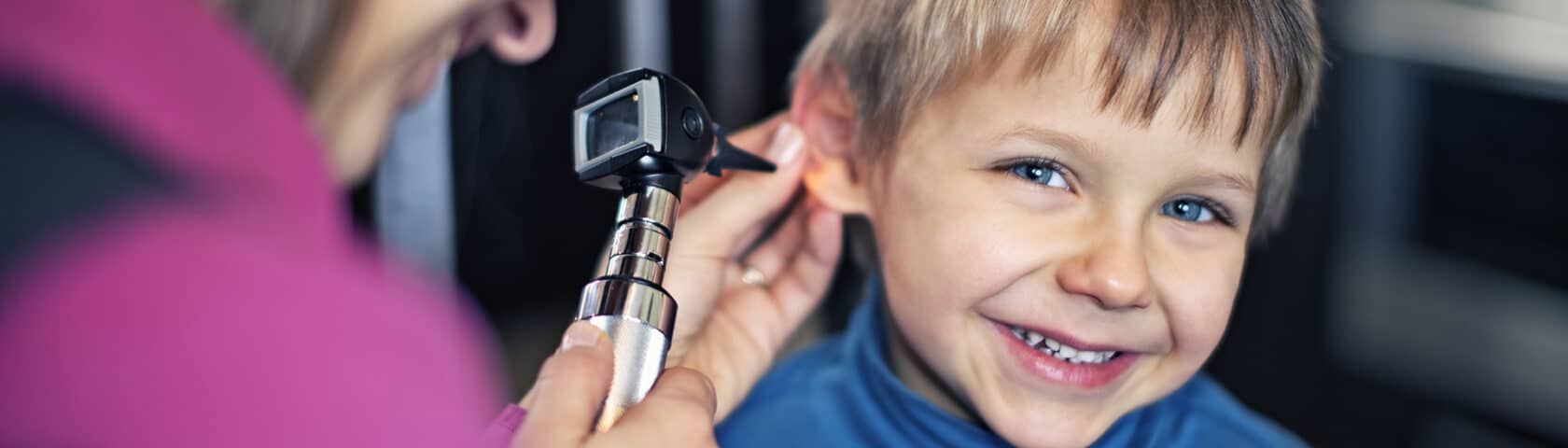 Happy Little Boy Having Home Visit Ear Exam
