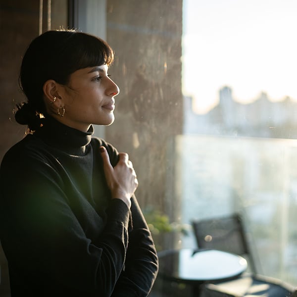 Young Woman Contemplating At Home