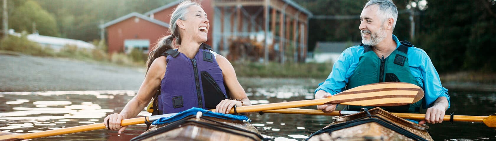 Mature Couple Has Fun Kayaking