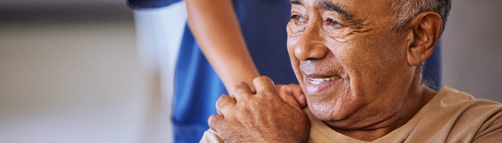 Nurse Or Doctor Give Man Support During Recovery Or Loss. Caregiver Holding Hand Of Her Sad Senior Patient And Showing Kindness While Doing A Checkup At A Retirement, Old Age Home Or Hospital