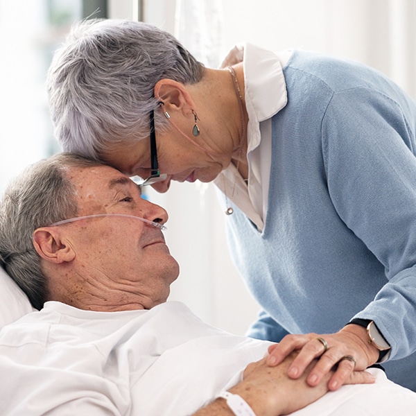 Hospital, Love Or Elderly Couple, Sick Patient And Affection For Empathy, Marriage Bond And Support For Senior Person. Retirement Healthcare, Forehead And Man With Medical Problem, Cancer Or Disease