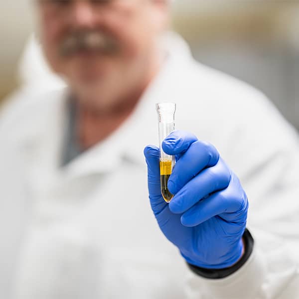 Lab tech performing tests on a sample.