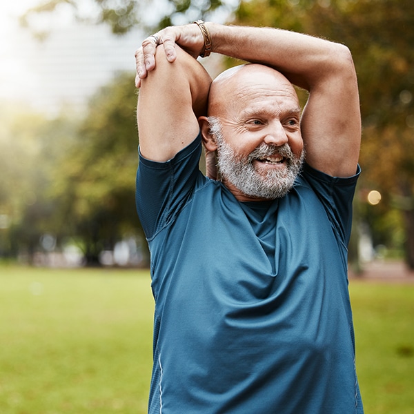 Stretching, Fitness And Running With Old Man In Park For Health, Workout Or Sports With Mockup. Warm Up, Retirement And Exercise With Senior Runner In Nature For Training, Jogger And Cardio Endurance