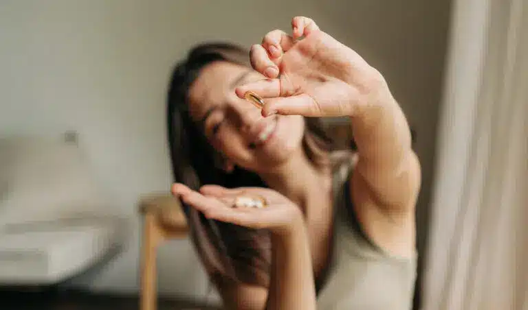 Woman Holding Medicine 768x452.jpg