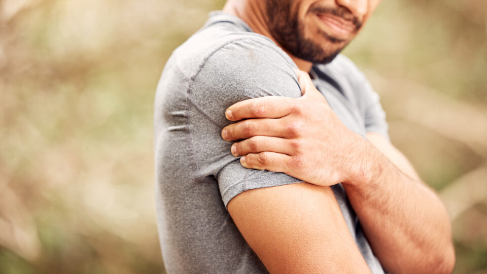 Shot Of An Unrecognisable Man Experiencing Shoulder Pain While Working Out In Nature