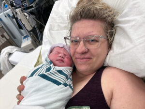 CRMC patient Taylor Serocki holding newborn daughter Georgia after a maternal-assisted c-section.