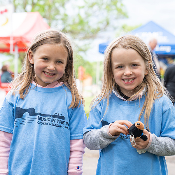 Young parents share a light hearted moment with their son.