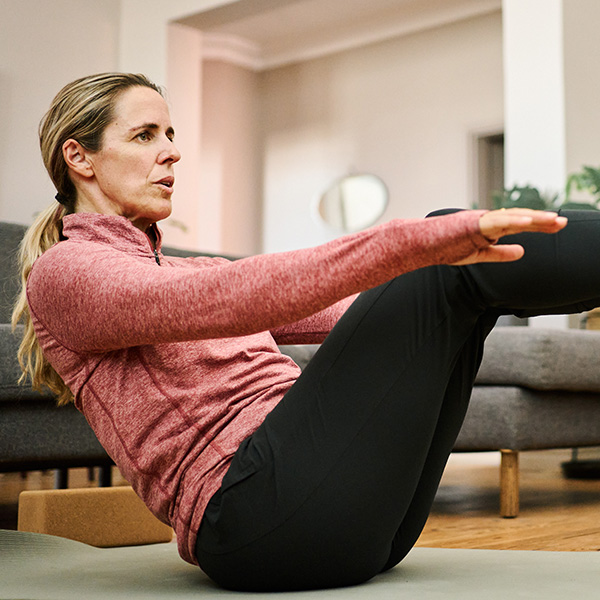Woman practicing a strengthening exercise, reflecting non-surgical incontinence care provided by CRMC urology.