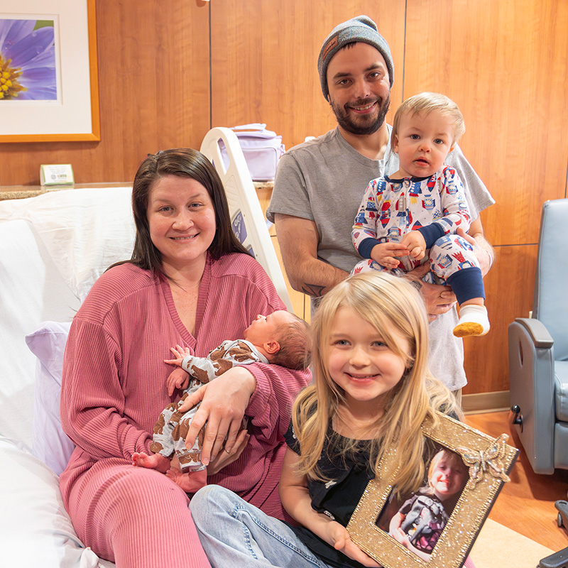 Parents Sarah Dear and Louis Wickizer with siblings Kataleya, Lilliana, and Christian, celebrating the birth of Daniel Louis at CRMC.