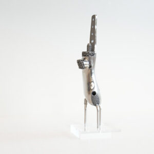 Custom 3D-printed titanium fibula implant designed for ankle reconstruction surgery at CRMC.