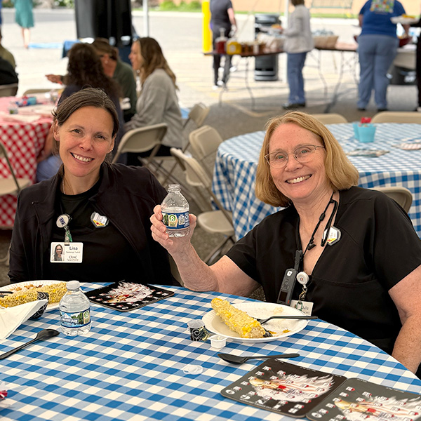 Working friends enjoying CRMC's employee picnic.
